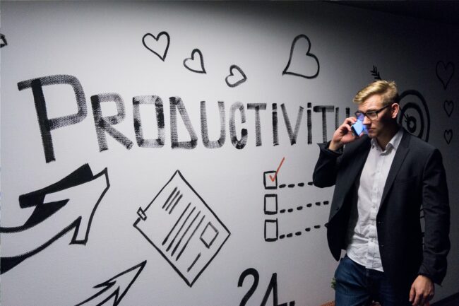 Productivity mural with man working
